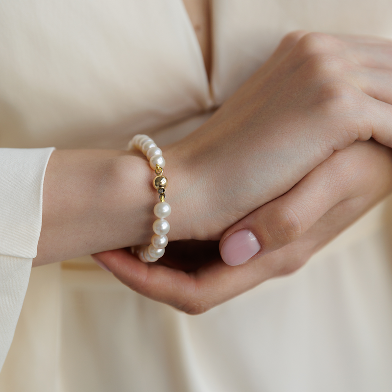 Perlų apyrankė su auksu