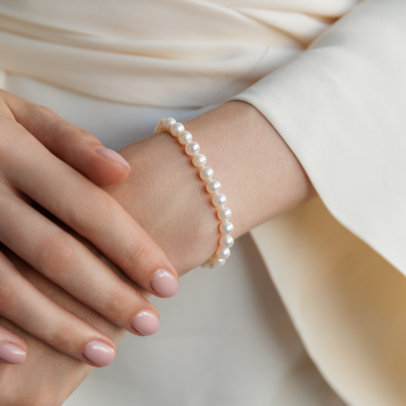 Perlų apyrankė su auksu