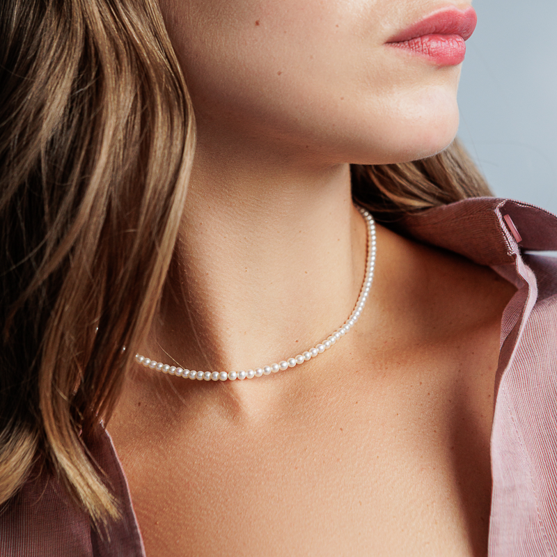 Perlų vėrinys su auksu